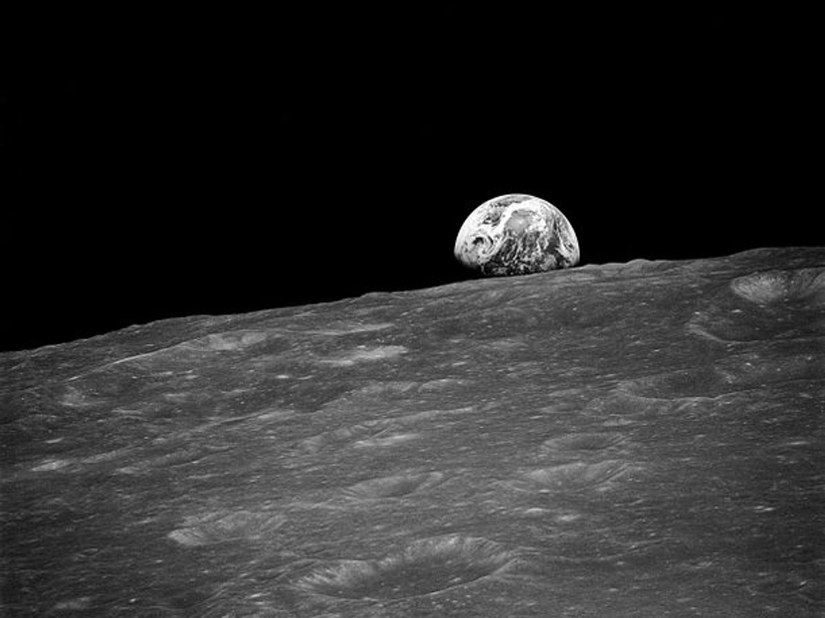 Earth rising above the surface of the Moon, photographed from Apollo 8